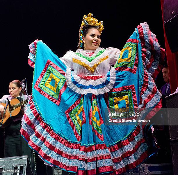 Fiesta costumed dancers perform during Mariachi and Banda Musician Ezequiel Peñas performance at Route 66 Casinos Legends Theater on March 28, 2015...