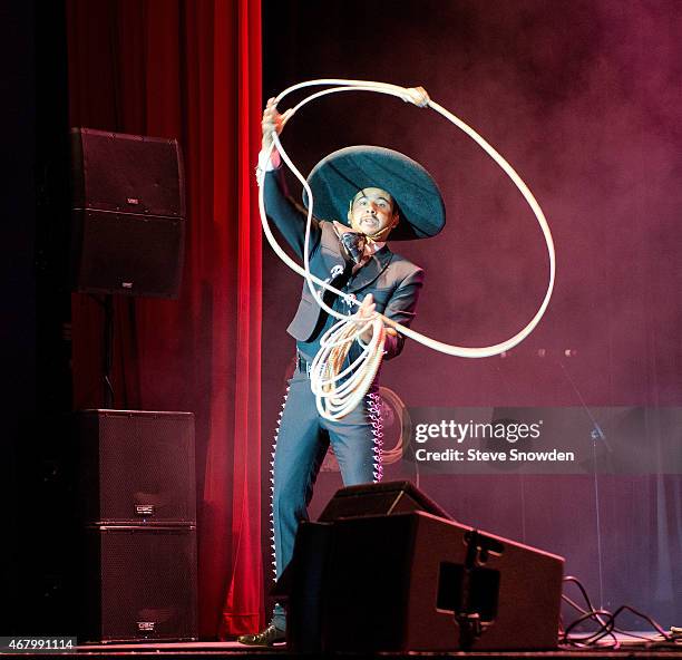 Rope artist performs during Mariachi and Banda Musician Ezequiel Peñas performance at Route 66 Casinos Legends Theater on March 28, 2015 in...