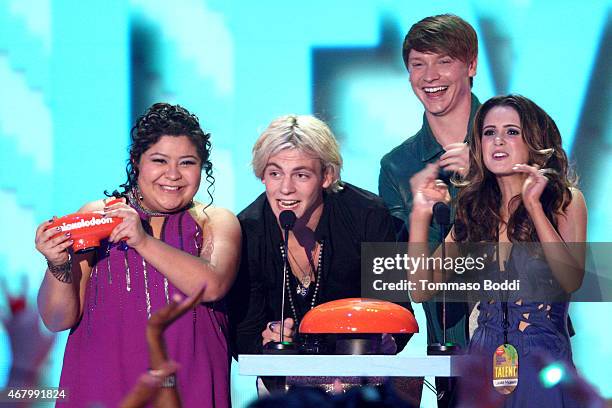 Actors Raini Rodriguez, Ross Lynch, Calum Worthy and Laura Marano accept award for Favorite Kids TV Show for 'Austin & Ally' onstage during the...