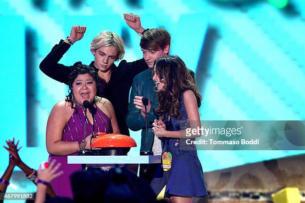 Actors Raini Rodriguez, Ross Lynch, Calum Worthy and Laura Marano accept award for Favorite Kids TV Show for 'Austin & Ally' onstage during the...