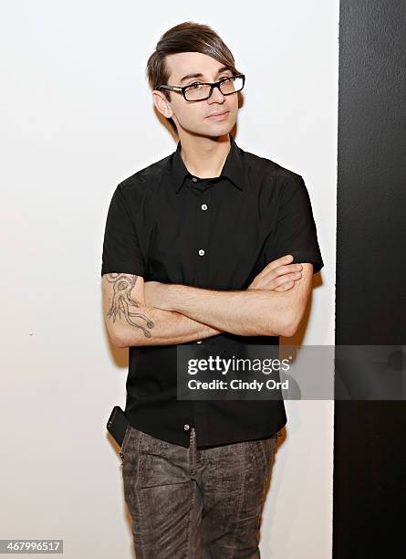 Designer Christian Siriano poses backstage at the Christian Siriano fashion show during the Mercedes-Benz Fashion Week Fall 2014 at Eyebeam on...