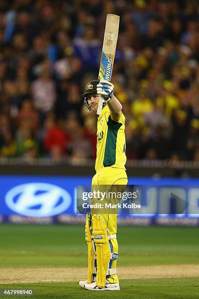 Michael Clarke of Australia celebrates after reaching his half century during the 2015 ICC Cricket World Cup final match between Australia and New...