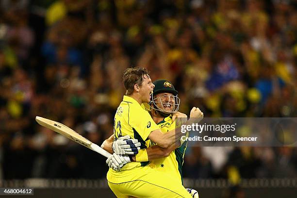 Steve Smith of Australia and team mate Shane Watson of Australia celebrate winning the 2015 ICC Cricket World Cup final match between Australia and...