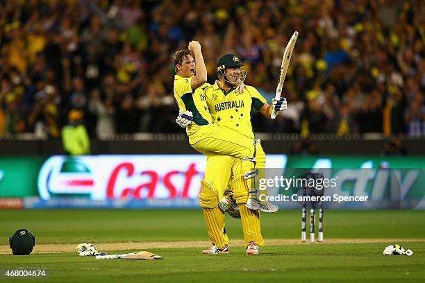 Steve Smith of Australia and team mate Shane Watson of Australia celebrate winning the 2015 ICC Cricket World Cup final match between Australia and...