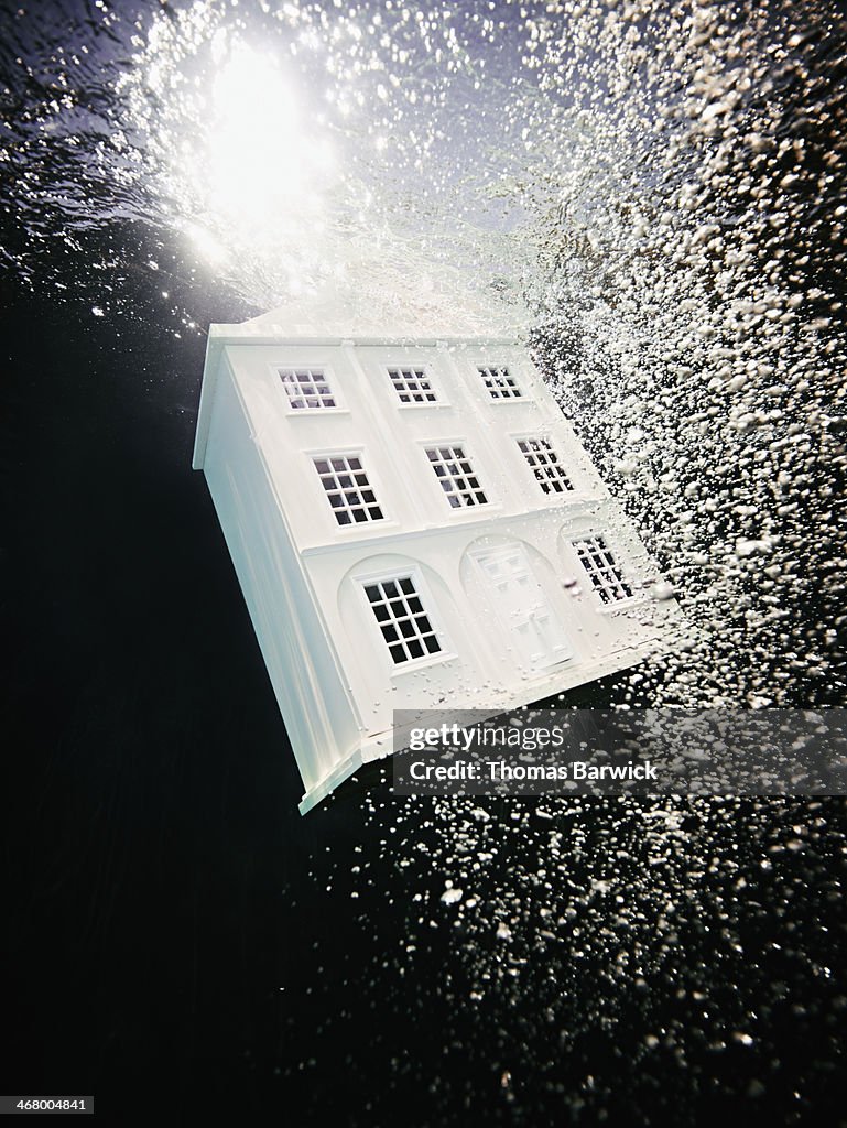 View from underwater of house sinking