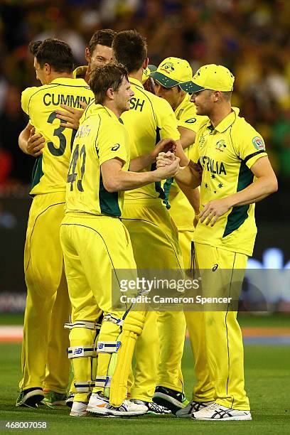 Steve Smith of Australia and captain Michael Clarke embrace after winning the 2015 ICC Cricket World Cup final match between Australia and New...