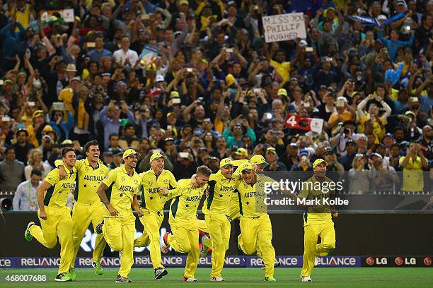 Australia celebrate victory during the 2015 ICC Cricket World Cup final match between Australia and New Zealand at Melbourne Cricket Ground on March...
