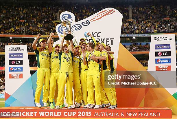 Australian captain Michael Clarke and Australian players celebrate winning during the 2015 ICC Cricket World Cup final match between Australia and...