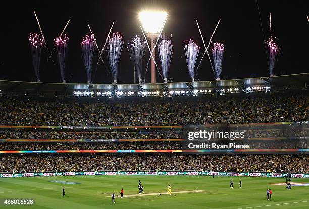 Steve Smith and Shane Watson of Australia celebrate after hitting the winning runs during the 2015 ICC Cricket World Cup final match between...