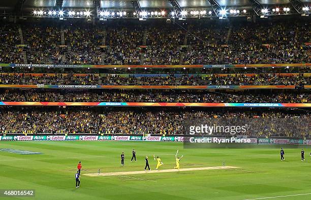 Steve Smith and Shane Watson of Australia celebrate after hitting the winning runs during the 2015 ICC Cricket World Cup final match between...