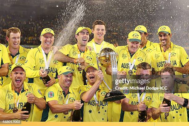 Australian captain Michael Clarke and Australian players celebrate winning during the 2015 ICC Cricket World Cup final match between Australia and...