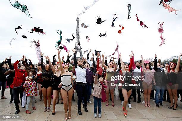 Women throw their bras up in the air during the 6th edition of the News  Photo - Getty Images