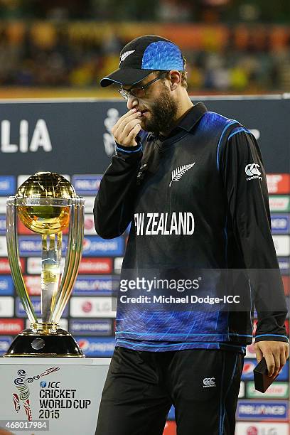 Daniel Vettori of New Zealand walks past the trophy after their defeat during the 2015 ICC Cricket World Cup final match between Australia and New...