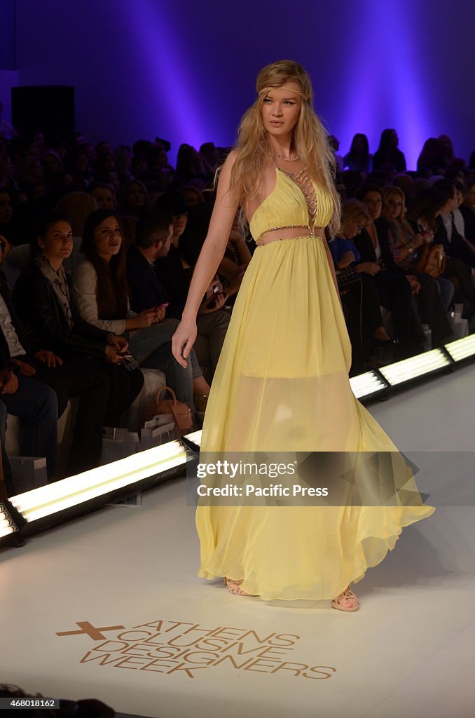 A model wears a ceation of Kathy Heyndels. 1 st day of...