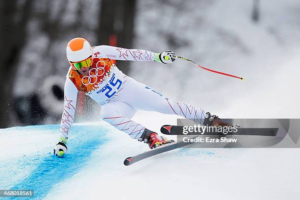 Marco Sullivan of the United States in action during the Alpine Men's Downhill on day two of the Sochi 2014 Winter Olympics at Rosa Khutor Alpine...