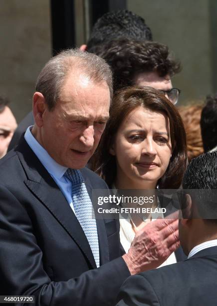 Former Paris mayor Bertrand Delanoe and EELV ecologist party member of parliament and former minister Cecile Duflot arrive to take part in an...