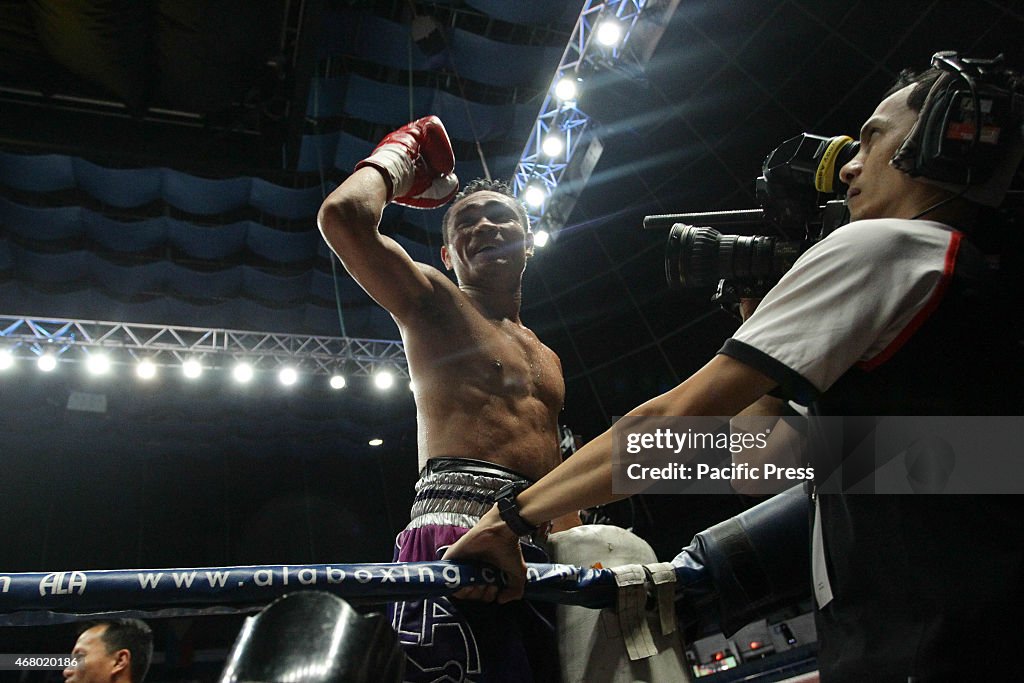 Donnie Nietes of the Philippines rejoices after defeating...