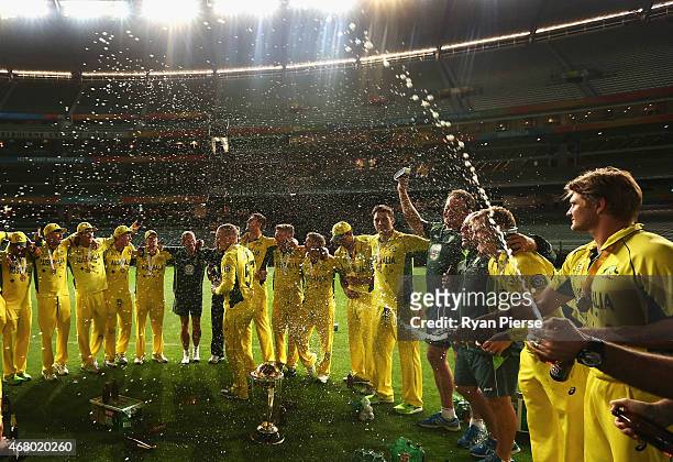 The Australian Team celebrate on the ground at 2.15am after the 2015 ICC Cricket World Cup final match between Australia and New Zealand at Melbourne...