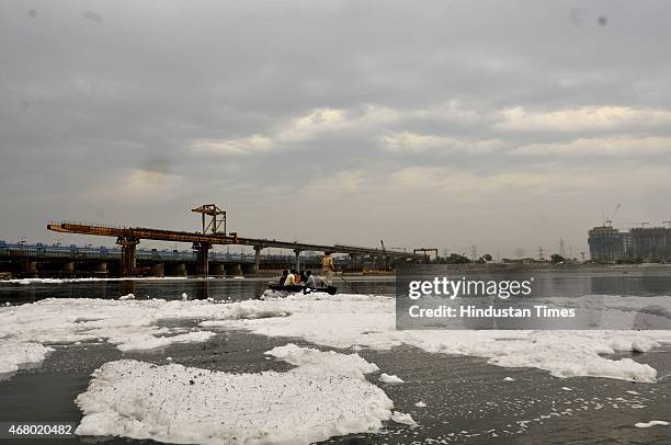 Devotees immersing Goddess Durga idols in Yamuna River, water of Yamuna is highly polluted, flouting the order of National Green Tribunal banning...