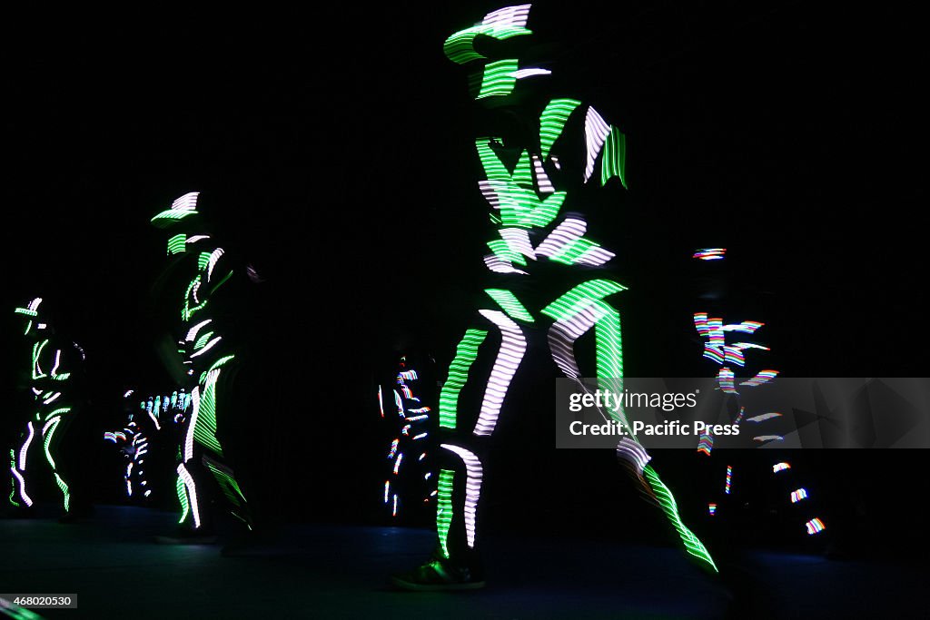 LED light dancers do their routine at the Quezon City Circle...