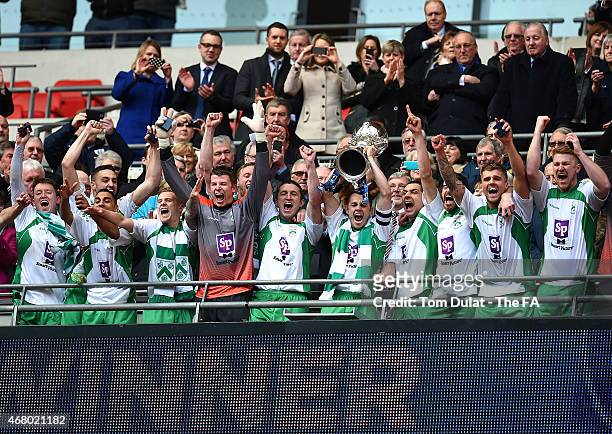 Captain of North Ferriby United Liam King lifts the trophy during the The FA Carlsberg Trophy Final between North Ferriby United and Wrexham at...