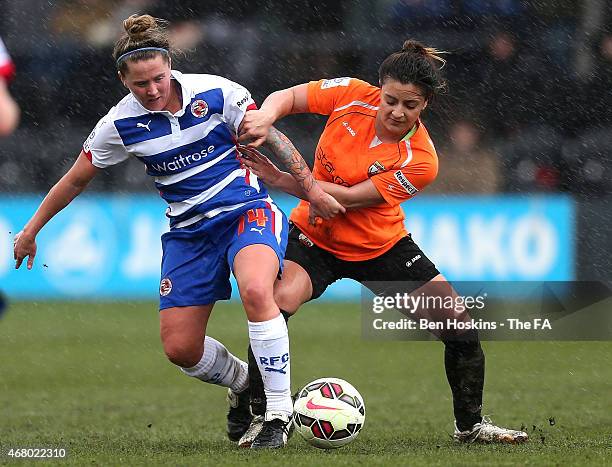 Laura May Walkley of Reading holds off the challenge of Andria Georgiou of London Bees during the WSL 2 match between London Bees and Reading FC...