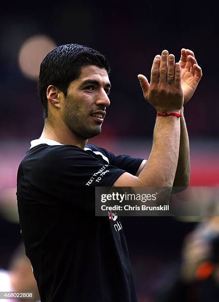 Luis Suarez of the Gerrard XI applauds the supporters following the Liverpool All-Star Charity match at Anfield on March 29, 2015 in Liverpool,...