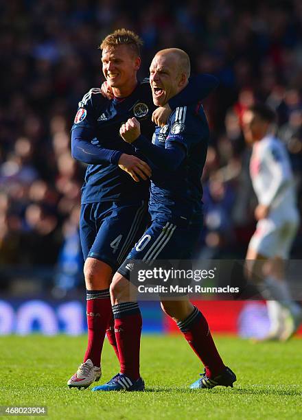 Steven Naismith of Scotland celebrates scoring their fourth goal with Matt Ritchie of Scotland during the EURO 2016 Qualifier match between Scotland...