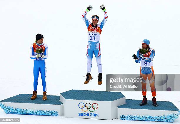 Silver medalist Christof Innerhofer of Italy, gold medalist Christof Innerhofer of Austria and bronze medalist Kjetil Jansrud of Norway stand on the...