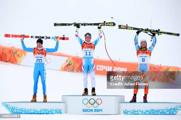 Silver medalist Christof Innerhofer of Italy, gold medalist Matthias Mayer of Austria and bronze medalist Kjetil Jansrud of Norway stand on the...