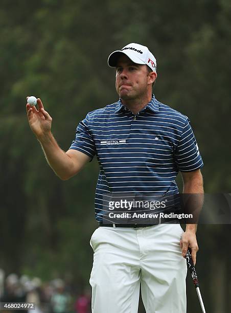 Richie Ramsay of Scotland acknowledges the crowd on the 18th green during the final round of the Trophee Hassan II at Golf du Palais Royal on March...