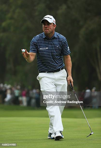 Richie Ramsay of Scotland acknowledges the crowd on the 18th green during the final round of the Trophee Hassan II at Golf du Palais Royal on March...