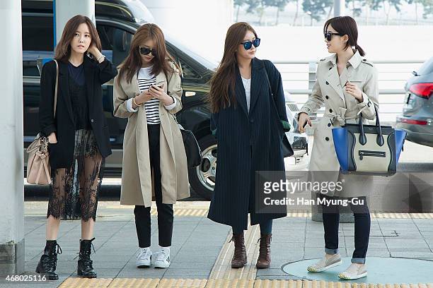 Hyomin , Jiyeon , Soyeon and Eunjung of South Korean girl group T-ara are seen on departure at Incheon International Airport on March 28, 2015 in...