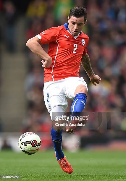 Eugenio Mena of Chile in action during the International Friendly match between Brazil and Chile at The Emirates Stadium in London, England on March...