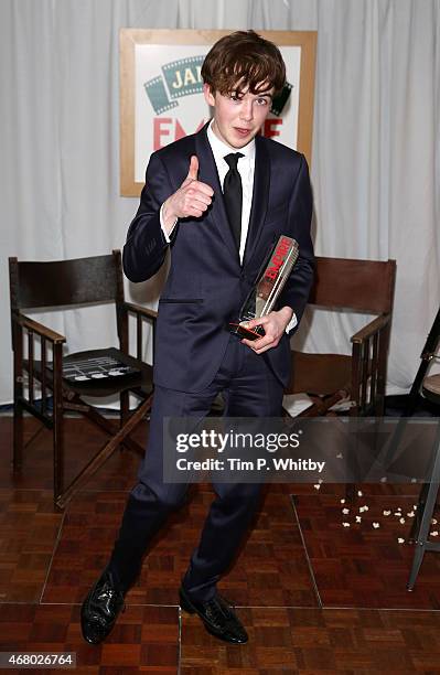 Alex Lawther collects the Best Thriller Award for The Imitation Game during the Jameson Empire Awards 2015 at the Grosvenor House Hotel on March 29,...