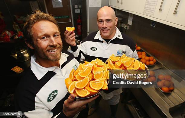 Land Rover ambassadors Jonny Wilkinson and Felipe Contepomi show oranges they have prepared for the players during the launch of the Land Rover Rugby...