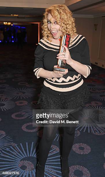 Screenwriter Jane Goldman poses in the Winners Room with the award for Best British Film for "Kingsman: The Secret Service" at the Jameson Empire...