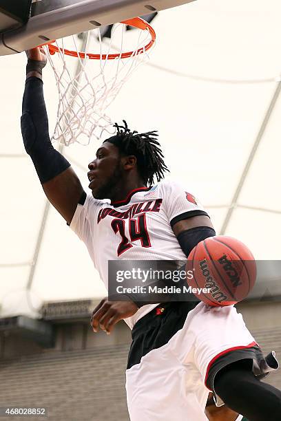 Montrezl Harrell of the Louisville Cardinals dunks the ball in the first half of the game against the Michigan State Spartans during the East...