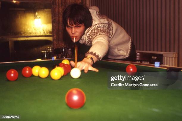 Gaz Coombes of Supergrass, playing pool, Oxford, United Kingdom, 1994.