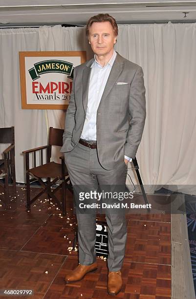 Liam Neeson poses in the Winners Room after presenting an award at the Jameson Empire Awards 2015 at Grosvenor House on March 29, 2015 in London,...
