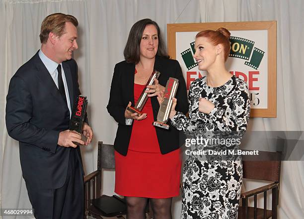 Director Christopher Nolan, producer Emma Thomas and actress Jessica Chastain, accepting on behalf of Best Film winner "Interstellar", pose in the...