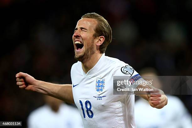 Harry Kane of England celebrates after scoring on his debut during the EURO 2016 Qualifier match between England and Lithuania at Wembley Stadium on...