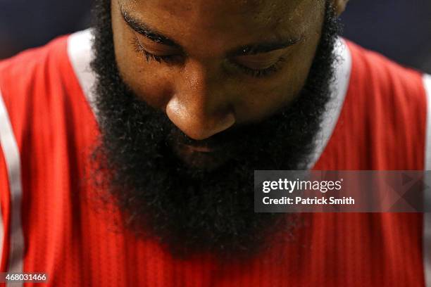 James Harden of the Houston Rockets looks on after defeating the Washington Wizards, 99-91, at Verizon Center on March 29, 2015 in Washington, DC....