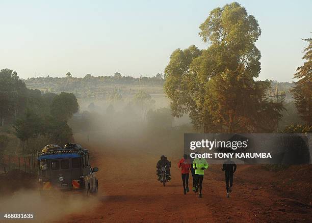 Picture taken on February 3, 2014 shows athletes training in Kenya's renowned high-altitude village of Iten, where professional runners from around...