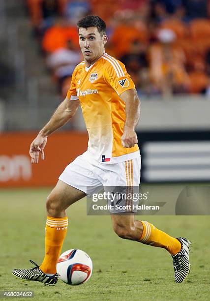 Will Bruin of the Houston Dynamo in action against the Colorado Rapids during their game at BBVA Compass Stadium on March 28, 2015 in Houston, Texas.