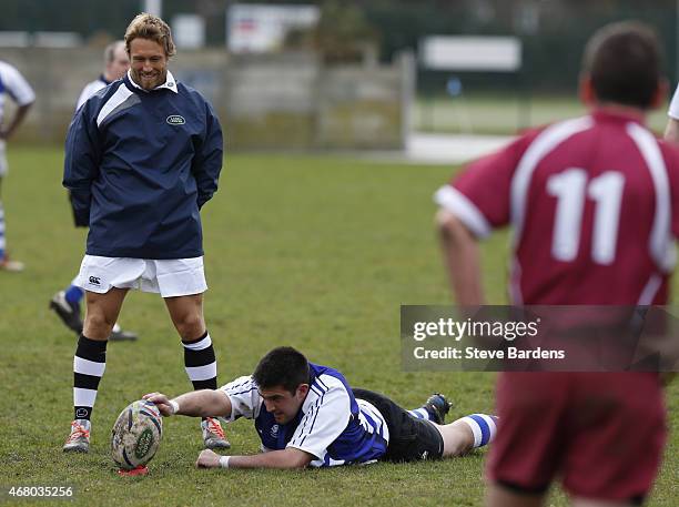 Land Rover ambassador Jonny Wilkinson watches as the ball is lined up for a penalty during the launch of the Land Rover Rugby World Cup 2015 "We Deal...