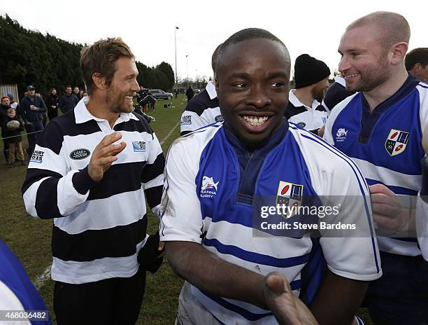 Land Rover ambassador Jonny Wilkinson claps the teams off the pitch during the launch of the Land Rover Rugby World Cup 2015 "We Deal In Real"...