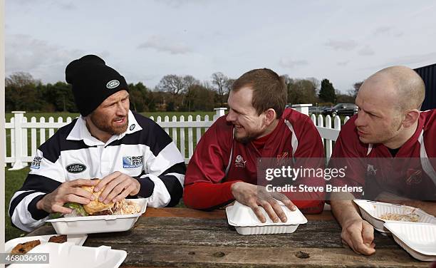 Matt Giteau of Australia chats with Streatham-Croydon RFC players during the launch of the Land Rover Rugby World Cup 2015 "We Deal In Real" campaign...