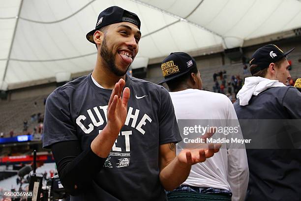 Denzel Valentine of the Michigan State Spartans celebrates defeating the Louisville Cardinals 76 to 70 in overtime of the East Regional Final of the...