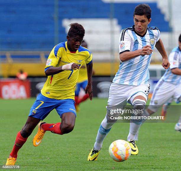 Washington Corozo of Ecuador and Julian Chicco of Argentina vie for the ball during their U-17 South American final round football match at Feliciano...